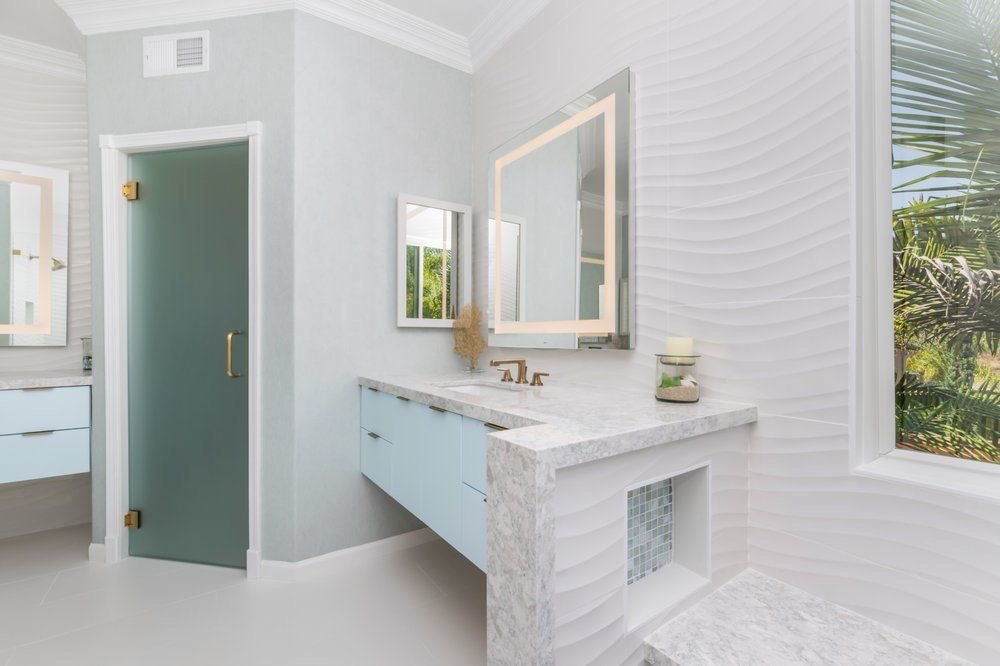Bathroom with floating vanity and quartz counter built by Akraba Remodeling in DFW