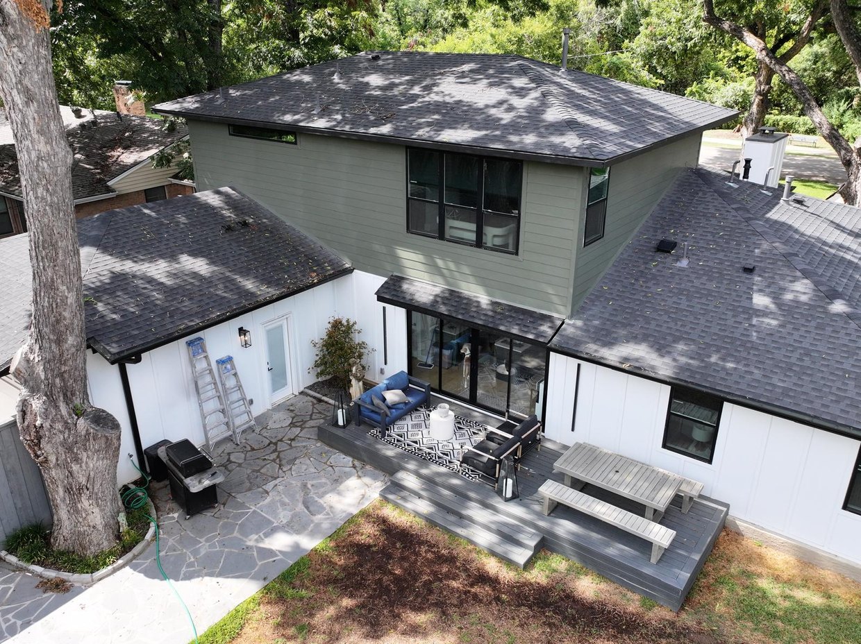 Second story addition and gray composite deck by Akraba Construction LLC, serving Garland, TX